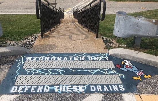 stormwater only message on storm drain