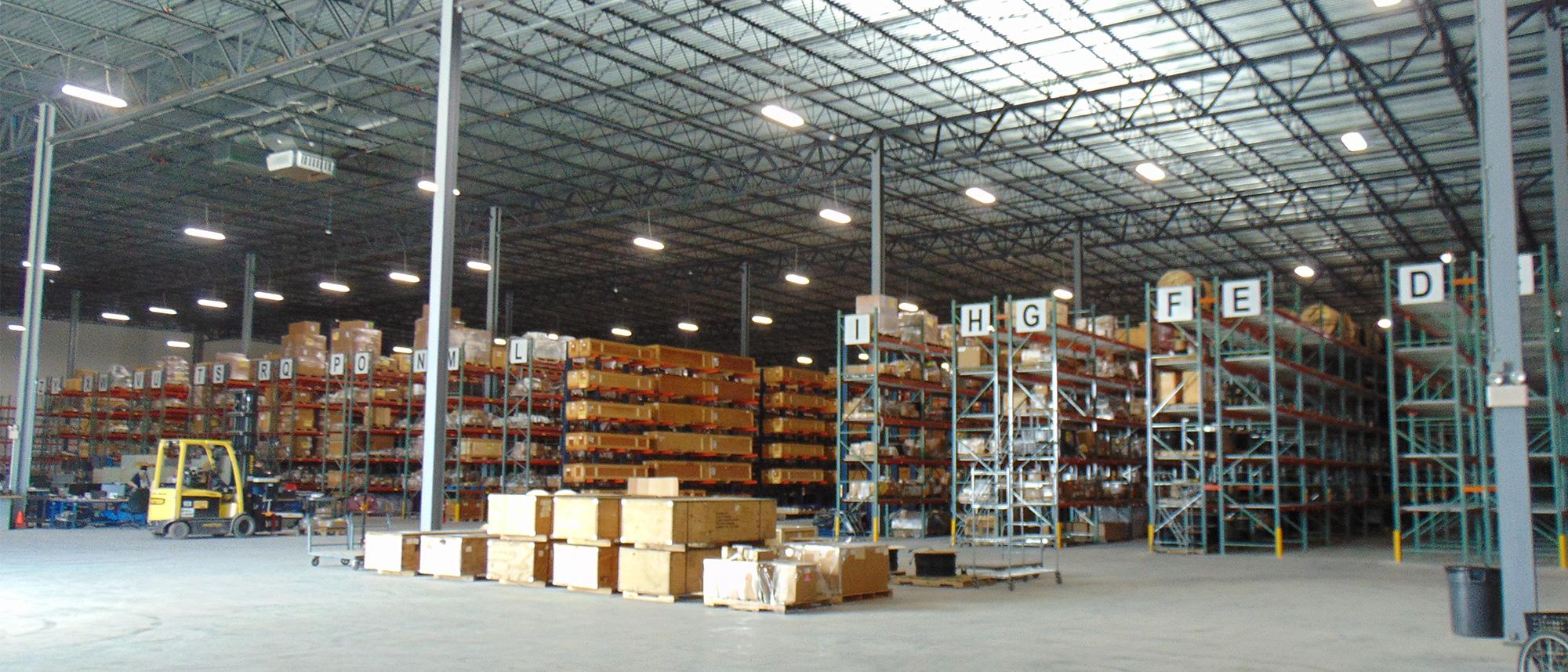 Warehouse facility with rows of boxes on shelves