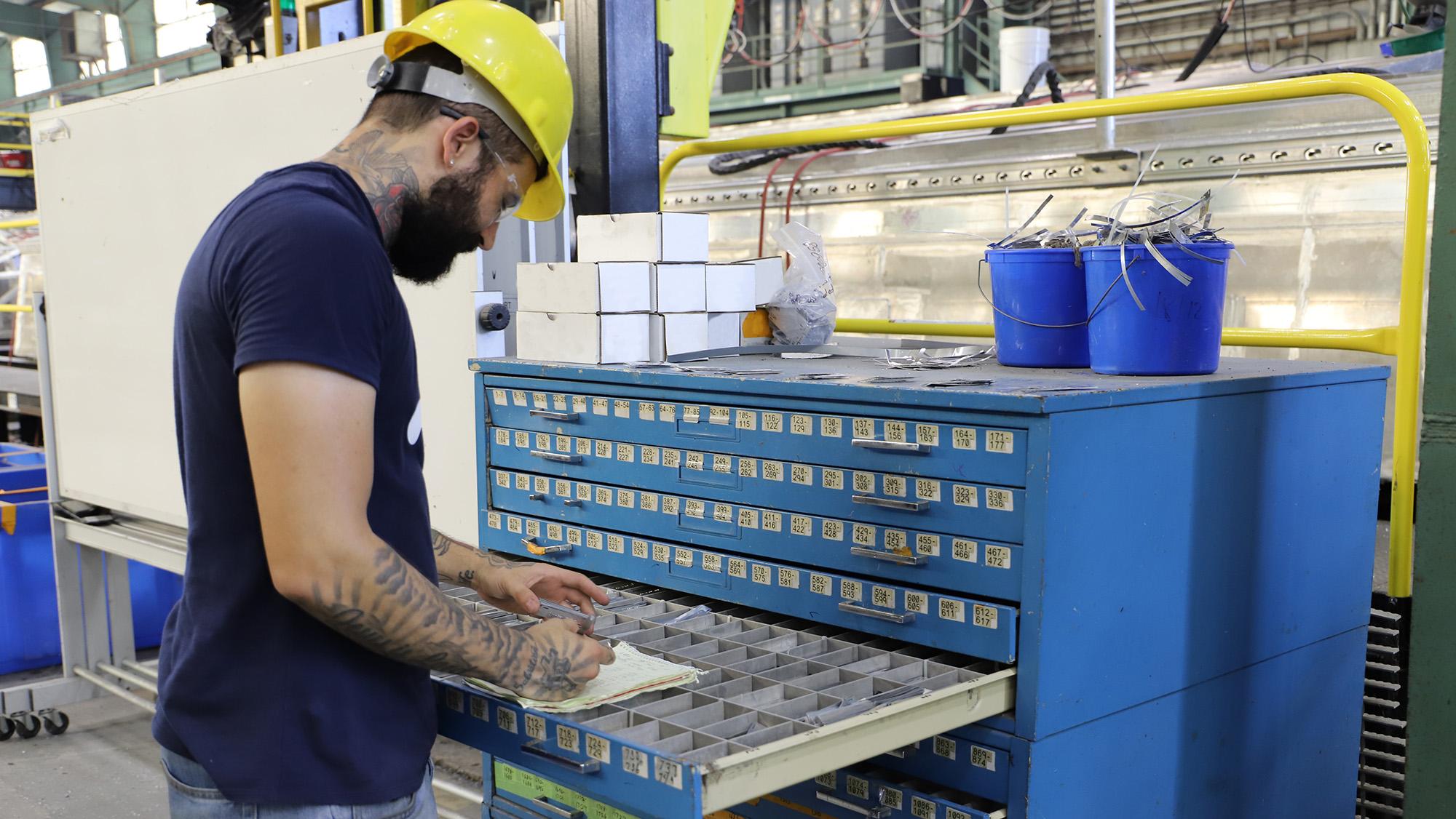 A manufacturing employee working