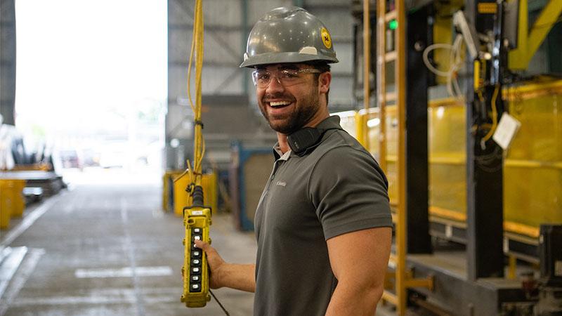 Worker at Textron Systems' shipyard