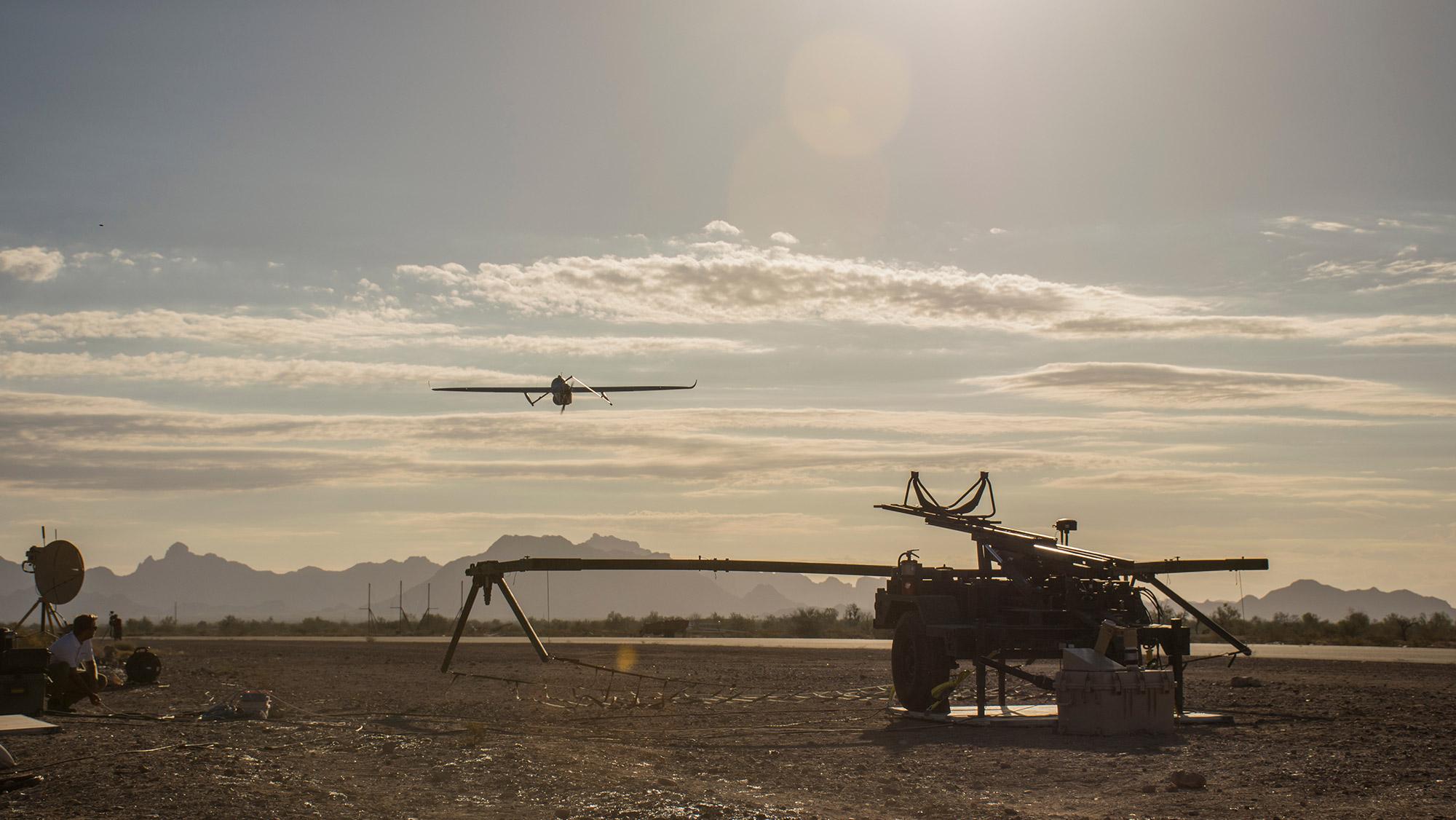 Aerosonde fixed wing view with launcher on ground