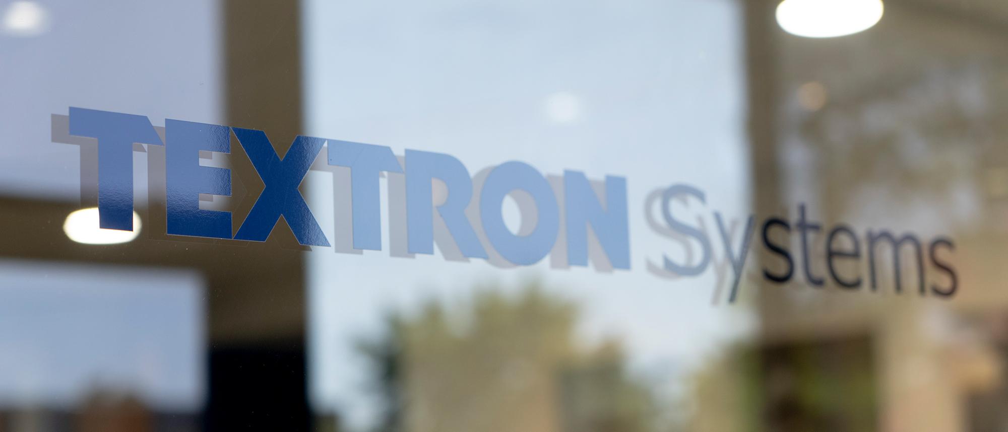 Photo of the Textron Systems Logo Decal on a Window