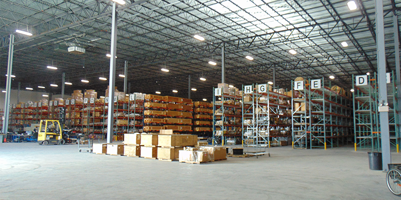Warehouse facility with rows of boxes on shelves