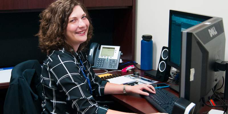 Robinett at desk