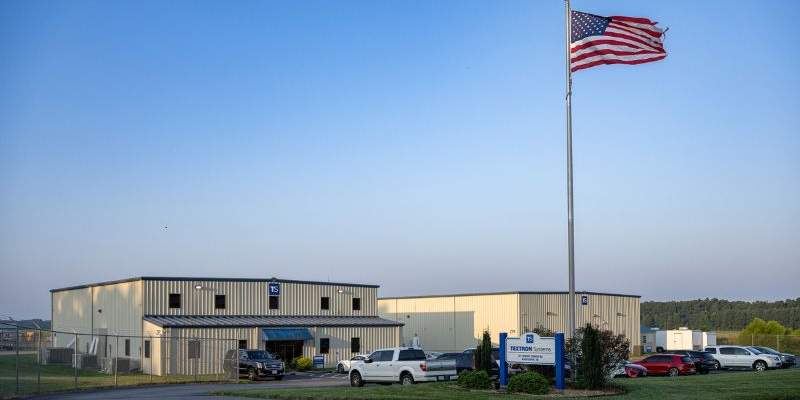 Building with American flag flying outside